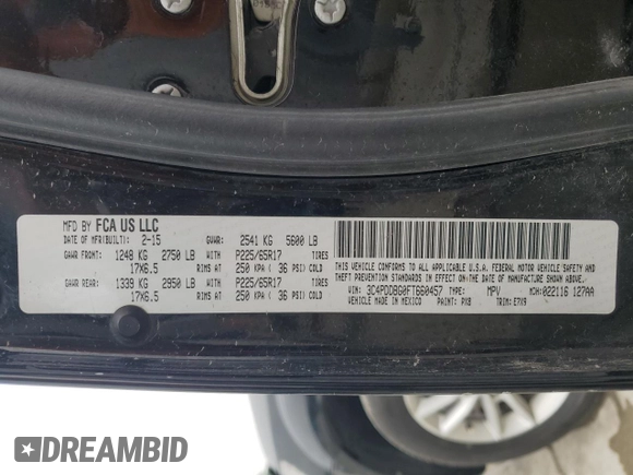 2015 Dodge Journey SXT with VIN 3C4PDDBG0FT660457, listed as a Copart auction lot 54582265 with 164,879 mi miles and Salvage title. Bid and sale history available at DreamBid. Image 13.
