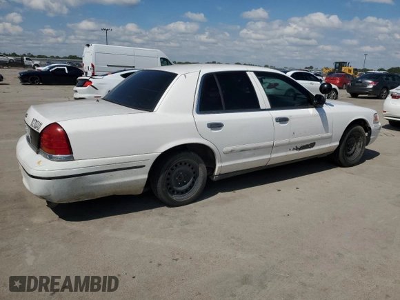 1999 Ford Crown Victoria Police z VIN 2FAFP71WXXX198735, wystawiony jako Copart lot #70526134 z przebiegiem 116 889 mil mil oraz Tytuł czysty. Historia ofert i sprzedaży dostępna na DreamBid. Obrazek 3.