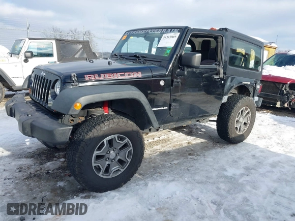 2013 Jeep Wrangler Rubicon 10th Anniversary with VIN 1C4BJWCG3DL591186, listed as a IAAI auction lot 41315969 with 54,984 mi miles and . Bid and sale history available at DreamBid. Image 21.