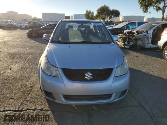 2012 Suzuki SX4 LE with VIN JS2YC5A33C6301529, listed as a Copart auction lot 79363394 with 72,348 mi miles and Clean Title. Bid and sale history available at carsss.com. Image 5.