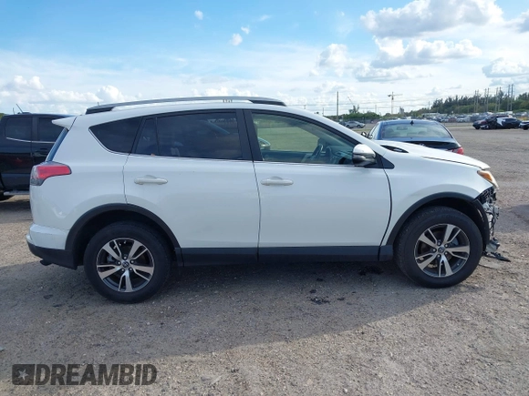 2018 Toyota RAV4 XLE with VIN JTMWFREV7JJ174483, listed as a IAAI auction lot 41597797 with 82,836 mi miles. Bid and sale history available at carsss.com. Image 14.