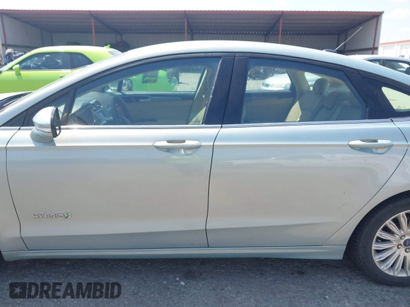 2014 Ford Fusion SE Hybrid with VIN 3FA6P0LU8ER251057, listed as a IAAI auction lot 42150589 with 188,192 mi miles and . Bid and sale history available at DreamBid. Image 14.