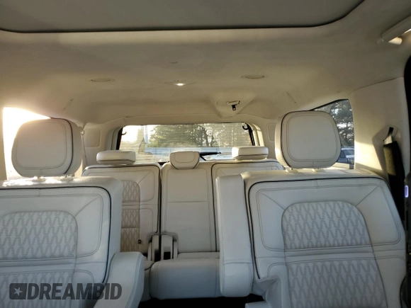 2021 Lincoln Navigator Black Label z VIN 5LMJJ3TT5MEL00238, wystawiony jako Copart lot #76951964 z przebiegiem 69 712 mil mil oraz Szkoda całkowita • Salvage title. Historia ofert i sprzedaży dostępna na DreamBid. Obrazek 10.