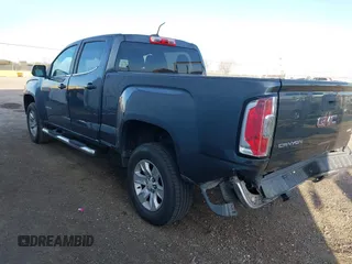 2015 GMC Canyon 2WD SLE with VIN 1GTG5BE35F1120622, listed as a IAAI auction lot 41421685 with 132,224 mi miles. Bid and sale history available at carsss.com. Image 3.