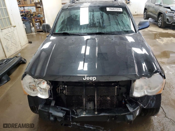 2010 Jeep Grand Cherokee Laredo with VIN 1J4RR4GT7AC160200, listed as a Copart auction lot 76682324 with 157,604 mi miles and Clean Title. Bid and sale history available at carsss.com. Image 5.