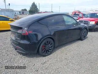 2022 Tesla Model Y Performance z VIN 7SAYGDEF5NF546680, wystawiony jako IAAI lot #42229359 z przebiegiem 55 597 mil mil oraz . Historia ofert i sprzedaży dostępna na DreamBid. Obrazek 4.