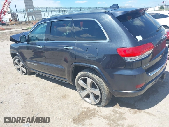 2015 Jeep Grand Cherokee High Altitude with VIN 1C4RJFCG5FC807394, listed as a IAAI auction lot 42452034 with 72,011 mi miles and . Bid and sale history available at DreamBid. Image 3.