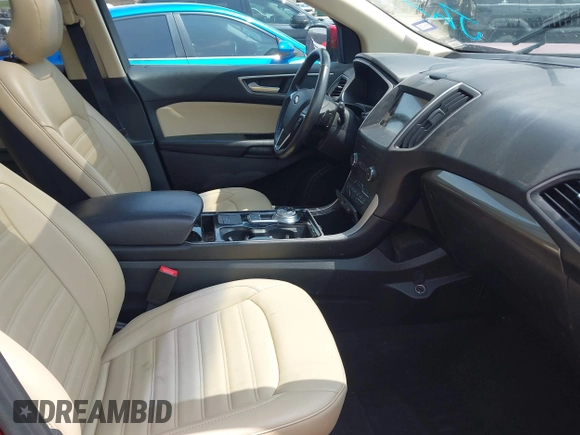 2019 Ford Edge SEL with VIN 2FMPK4J92KBB69060, listed as a IAAI auction lot 42248897 with 130,977 mi miles and . Bid and sale history available at DreamBid. Image 5.
