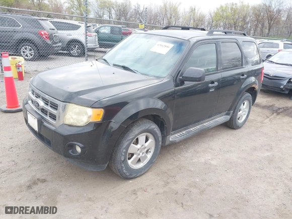 2012 Ford Escape XLT with VIN 1FMCU0D72CKC02397, listed as a IAAI auction lot 42042886 with 261,627 mi miles. Bid and sale history available at carsss.com. Image 2.
