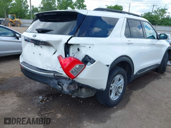 2023 Ford Explorer XLT with VIN 1FMSK8DH6PGC14487, listed as a IAAI auction lot 42381708 with 55,295 mi miles and . Bid and sale history available at DreamBid. Image 4.