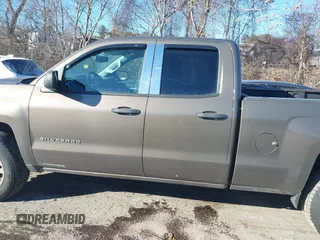 2014 Chevrolet Silverado 1500 LT with VIN 1GCVKREC9EZ300548, listed as a IAAI auction lot 41318981 with 237,113 mi miles and . Bid and sale history available at DreamBid. Image 14.