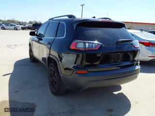 2019 Jeep Cherokee Latitude Plus with VIN 1C4PJLLBXKD176124, listed as a IAAI auction lot 41851150 with 90,101 mi miles. Bid and sale history available at carsss.com. Image 3.