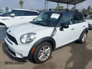 2013 MINI Countryman S with VIN WMWZC3C55DWP24628, listed as a IAAI auction lot 42558387 with 169,269 mi miles and . Bid and sale history available at DreamBid. Image 17.