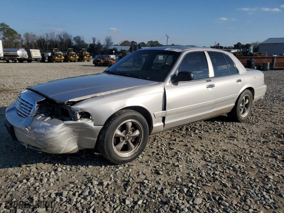 2004 Ford Crown Victoria LX with VIN 2FDFP74W74X150801, listed as a Copart auction lot 43869115 with 138,243 mi miles and Salvage Title. Bid and sale history available at carsss.com. Image 1.