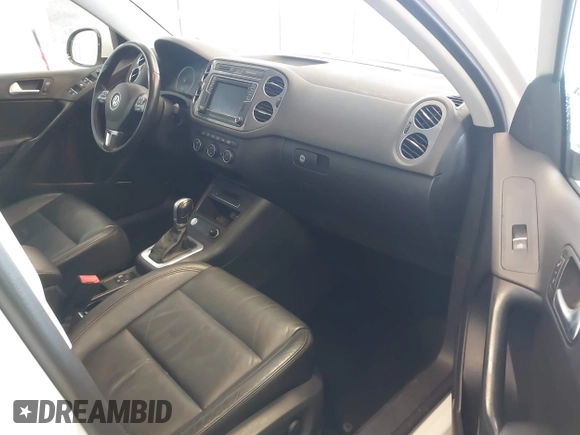 2016 Volkswagen Tiguan S with VIN WVGBV7AX0GW532236, listed as a IAAI auction lot 41610575 with 104,193 mi miles and . Bid and sale history available at DreamBid. Image 5.