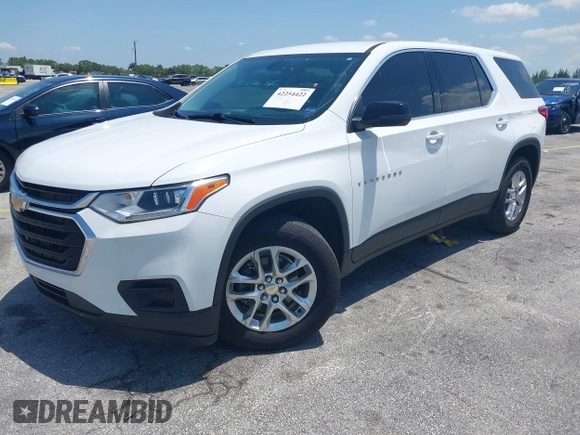 2021 Chevrolet Traverse LS with VIN 1GNERFKWXMJ201136, listed as a IAAI auction lot 42254422 with 50,663 mi miles and . Bid and sale history available at DreamBid. Image 2.