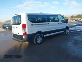 2023 Ford Transit Passenger XL with VIN 1FBAX2Y8XPKB33065, listed as a IAAI auction lot 41440531 with 21,155 mi miles and . Bid and sale history available at DreamBid. Image 4.