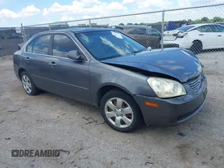 2007 Kia Optima LX z VIN KNAGE123375110290, wystawiony jako IAAI lot #42586225 z przebiegiem 49 928 mil mil oraz . Historia ofert i sprzedaży dostępna na DreamBid. Obrazek 1.