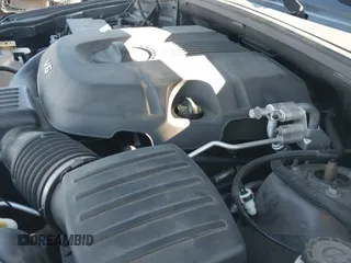 2015 Jeep Grand Cherokee Overland z VIN 1C4RJFCG8FC943437, wystawiony jako IAAI lot #43472646 z przebiegiem 135 627 mil mil oraz . Historia ofert i sprzedaży dostępna na DreamBid. Obrazek 19.