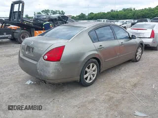 2004 Nissan Maxima SE with VIN 1N4BA41E74C858809, listed as a IAAI auction lot 42436562 with 198,105 mi miles and . Bid and sale history available at DreamBid. Image 4.