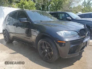2011 BMW X5 M with VIN 5YMGY0C55BLK27157, listed as a Copart auction lot 65929154 with 0 mi miles and Salvage Title. Bid and sale history available at carsss.com. Image 4.