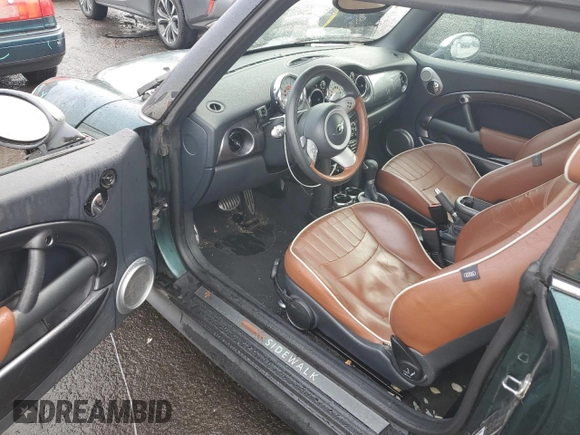 2007 MINI Convertible S with VIN WMWRH33517TL95143, listed as a Copart auction lot 88068045 with 115,827 mi miles and Salvage title. Bid and sale history available at DreamBid. Image 8.