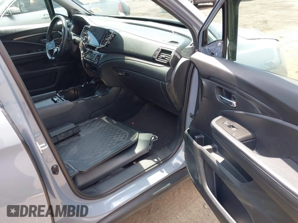 2022 Honda Pilot Special Edition with VIN 5FNYF6H27NB104990, listed as a IAAI auction lot 42219770 with 23,200 mi miles and . Bid and sale history available at DreamBid. Image 5.