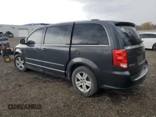 2011 Dodge Grand Caravan Crew with VIN 2D4RN5DG2BR762738, listed as a Copart auction lot 49528955 with 203,748 mi miles and Clean Title. Bid and sale history available at DreamBid. Image 2.
