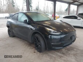 2023 Tesla Model Y Long Range with VIN 7SAYGAEEXPF707503, listed as a IAAI auction lot 41712166 with 27,467 mi miles and . Bid and sale history available at carsss.com. Image 1.