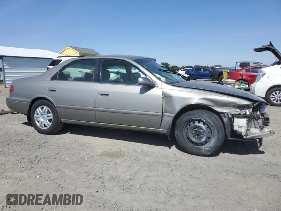 2001 Toyota Camry CE z VIN JT2BG22K410568101, wystawiony jako Copart lot #57184125 z przebiegiem Nie podano mil oraz Szkoda całkowita • Salvage title. Historia ofert i sprzedaży dostępna na DreamBid. Obrazek 4.