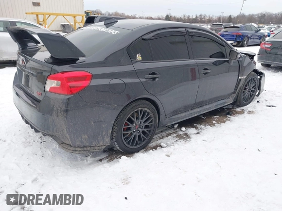2015 Subaru WRX STI with VIN JF1VA2L60F9803514, listed as a IAAI auction lot 41591735 with 82,700 mi miles and . Bid and sale history available at DreamBid. Image 4.