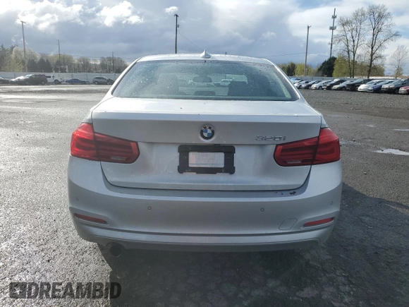 2018 BMW 3 Series 320i with VIN WBA8A9C57JAD27972, listed as a Copart auction lot 51279135 with 64,444 mi miles and Salvage title. Bid and sale history available at DreamBid. Image 6.