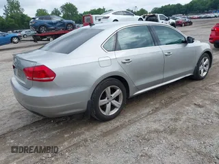 2013 Volkswagen Passat SE with VIN 1VWBP7A30DC098440, listed as a IAAI auction lot 42722686 with 305,716 mi miles and . Bid and sale history available at DreamBid. Image 4.