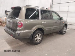 2007 Honda Pilot EX-L z VIN 2HKYF185X7H505077, wystawiony jako IAAI lot #42362215 z przebiegiem 174 592 mil mil oraz . Historia ofert i sprzedaży dostępna na DreamBid. Obrazek 4.