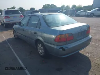 1999 Honda Civic LX z VIN 2HGEJ6670XH566953, wystawiony jako IAAI lot #42390891 z przebiegiem 290 417 mil mil oraz . Historia ofert i sprzedaży dostępna na DreamBid. Obrazek 3.
