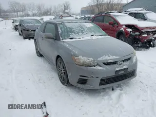 2012 Scion tC z VIN JTKJF5C7XC3035181, wystawiony jako IAAI lot #41623656 z przebiegiem 118 040 mil mil oraz . Historia ofert i sprzedaży dostępna na DreamBid. Obrazek 1.