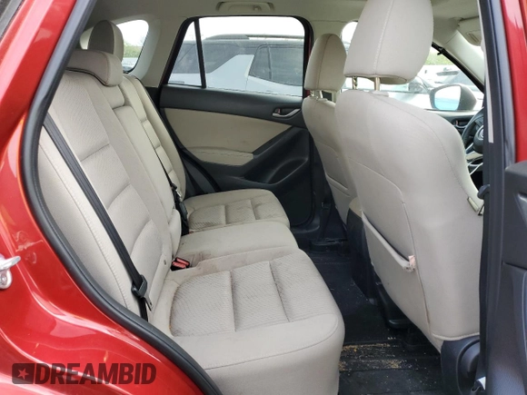 2014 Mazda CX-5 Touring with VIN JM3KE2CY6E0316041, listed as a Copart auction lot 52227835 with 69,921 mi miles and Salvage Title. Bid and sale history available at DreamBid. Image 11.