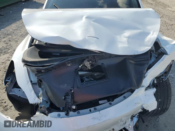 2025 Tesla Model Y Long Range with VIN 7SAYGDED3SA339079, listed as a Copart auction lot 82041424 with 1,793 mi miles and Salvage Title. Bid and sale history available at DreamBid. Image 13.