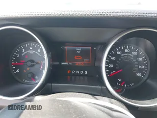 2020 Ford Mustang EcoBoost z VIN 1FATP8UH0L5105965, wystawiony jako IAAI lot #42475841 z przebiegiem 68 999 mil mil oraz . Historia ofert i sprzedaży dostępna na DreamBid. Obrazek 7.