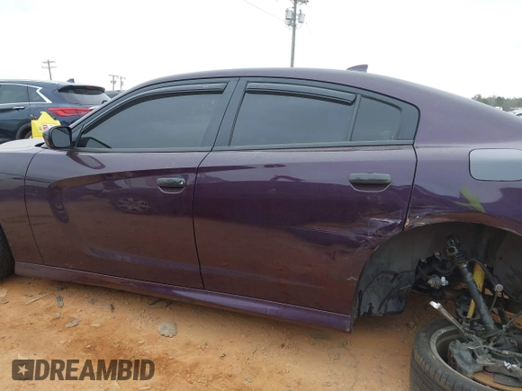 2021 Dodge Charger Scat Pack Widebody with VIN 2C3CDXGJ5MH579324, listed as a IAAI auction lot 41399676 with 77,156 mi miles and . Bid and sale history available at DreamBid. Image 14.