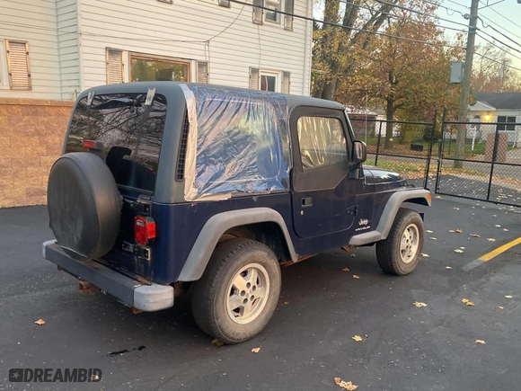 2003 Jeep Wrangler SE with VIN 1J4FA29143P371506, listed as a Copart auction lot 80153184 with 101,513 mi miles and Clean Title. Bid and sale history available at carsss.com. Image 4.