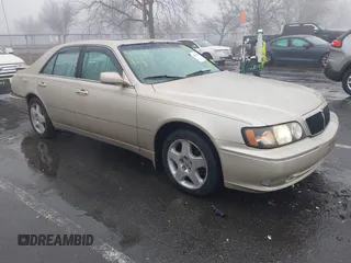 2001 Infiniti Q45 Touring with VIN JNKBY31A31M100189, listed as a IAAI auction lot 41557050 with 109,874 mi miles and . Bid and sale history available at DreamBid. Image 1.