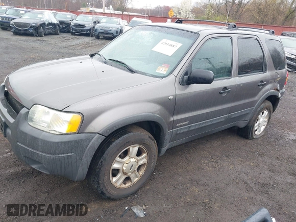 2002 Ford Escape XLT Choice with VIN 1FMYU04122KC36937, listed as a IAAI auction lot 42014887 with 141,885 mi miles. Bid and sale history available at carsss.com. Image 2.