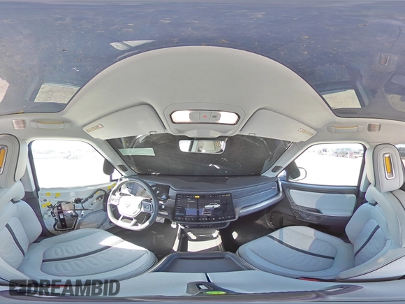 2024 Rivian R1T Adventure z VIN 7FCTGCAA9RN030318, wystawiony jako Copart lot #77036474 z przebiegiem 3 522 mil mil oraz Szkoda całkowita • Salvage title. Historia ofert i sprzedaży dostępna na DreamBid. Obrazek 13.