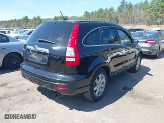 2009 Honda CR-V EX-L with VIN JHLRE48799C012129, listed as a IAAI auction lot 42016110 with 141,819 mi miles. Bid and sale history available at carsss.com. Image 4.