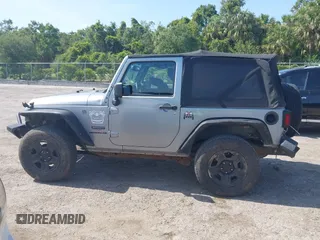 2014 Jeep Wrangler Sport with VIN 1C4AJWAG0EL126459, listed as a IAAI auction lot 42286803 with 179,025 mi miles and . Bid and sale history available at DreamBid. Image 14.