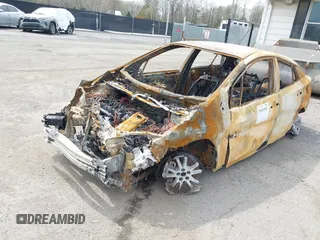 2021 Toyota Prius LE with VIN JTDKAMFPXM3180612, listed as a IAAI auction lot 39151391 with Not Provided miles and . Bid and sale history available at DreamBid. Image 2.