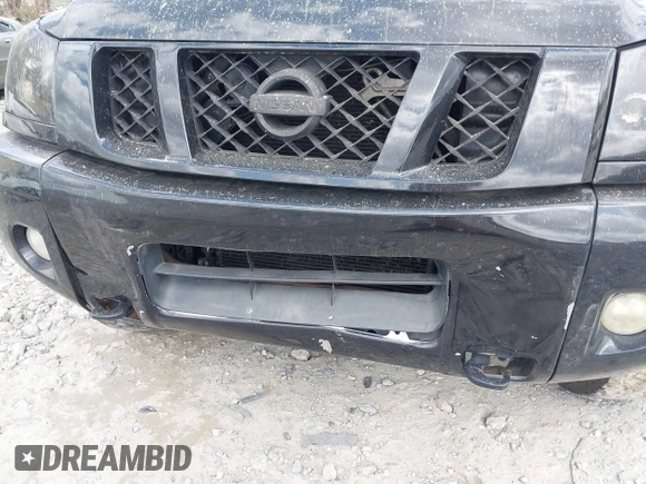 2009 Nissan Titan LE with VIN 1N6BA07D79N317253, listed as a IAAI auction lot 41944642 with 231,896 mi miles. Bid and sale history available at carsss.com. Image 6.