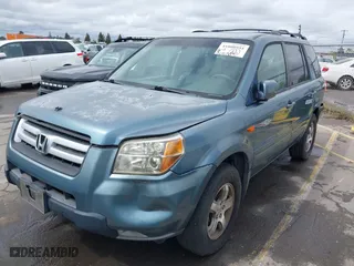 2007 Honda Pilot EX-L with VIN 5FNYF28597B006341, listed as a IAAI auction lot 41808955 with 225,819 mi miles. Bid and sale history available at carsss.com. Image 2.