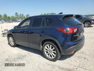 2013 Mazda CX-5 Grand Touring with VIN JM3KE2DE4D0147902, listed as a Copart auction lot 52696685 with 331,168 mi miles and Clean Title. Bid and sale history available at carsss.com. Image 2.